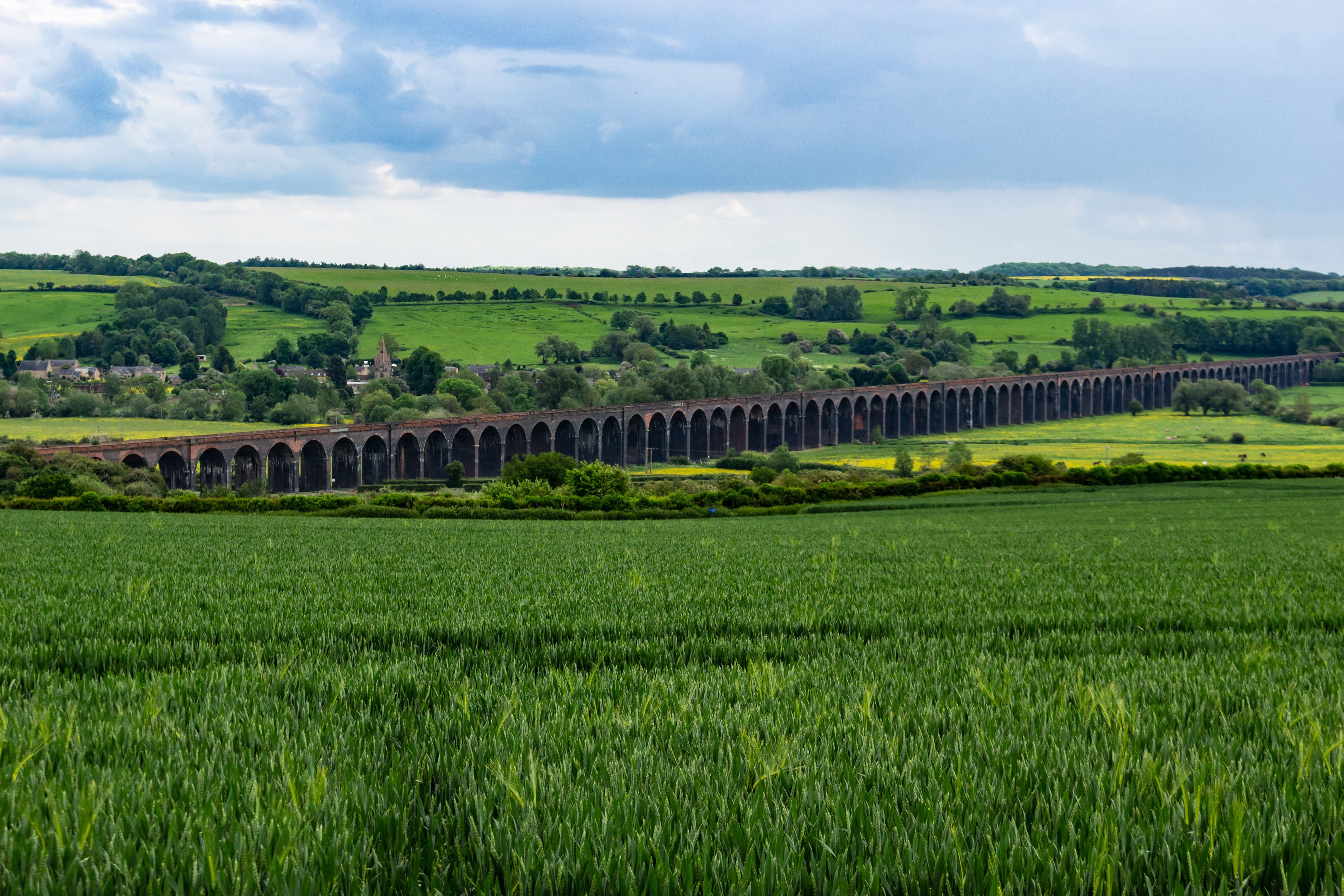 Long bridge in the countryside, surrounded by rolling