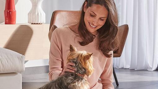 Woman sitting with her dog