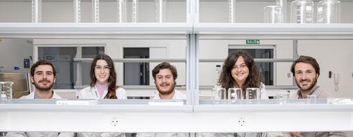 A group of scientists in their lab