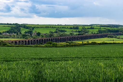 Long bridge in the countryside, surrounded by rolling